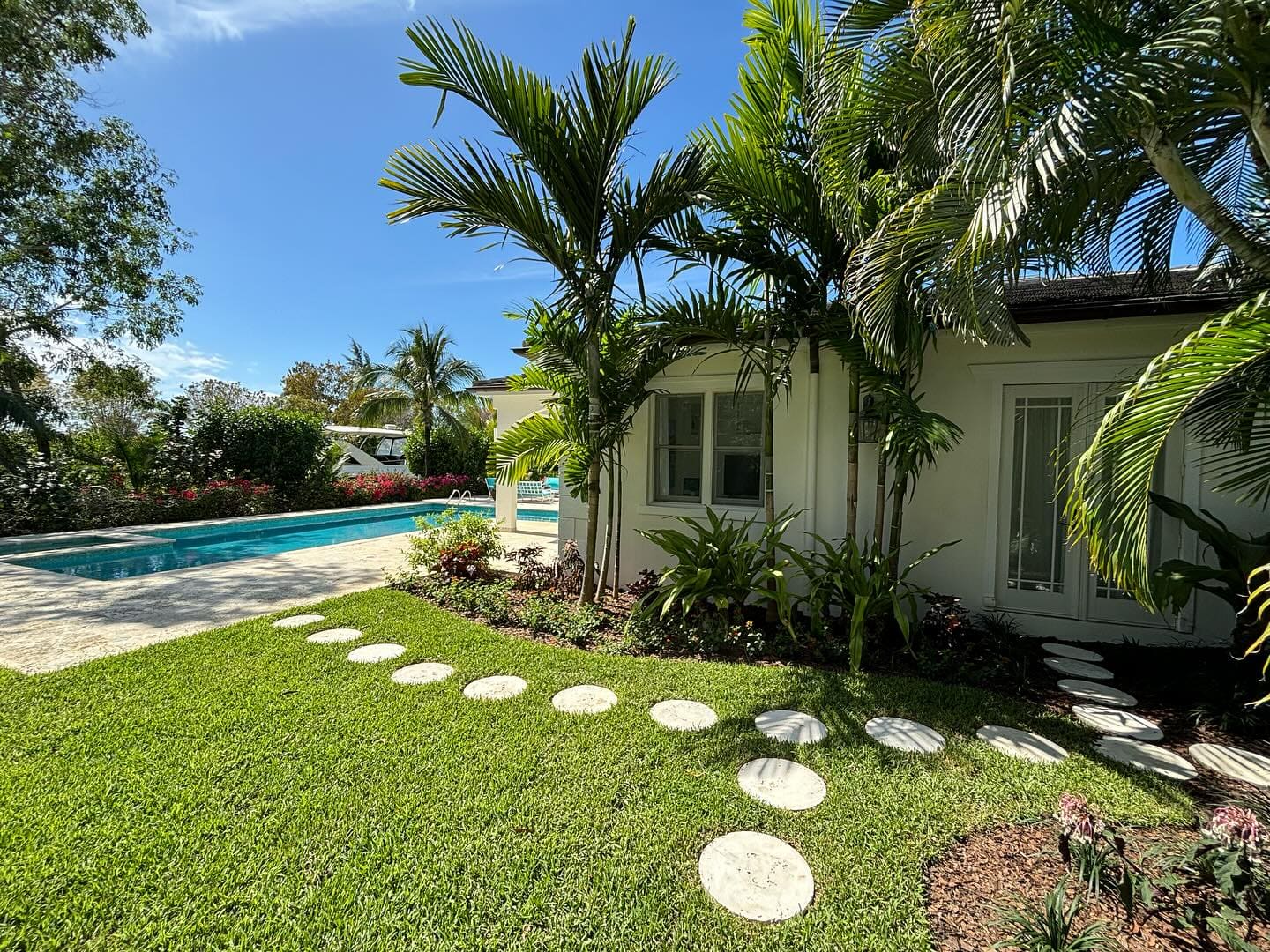 Bahamian residential exterior with palms